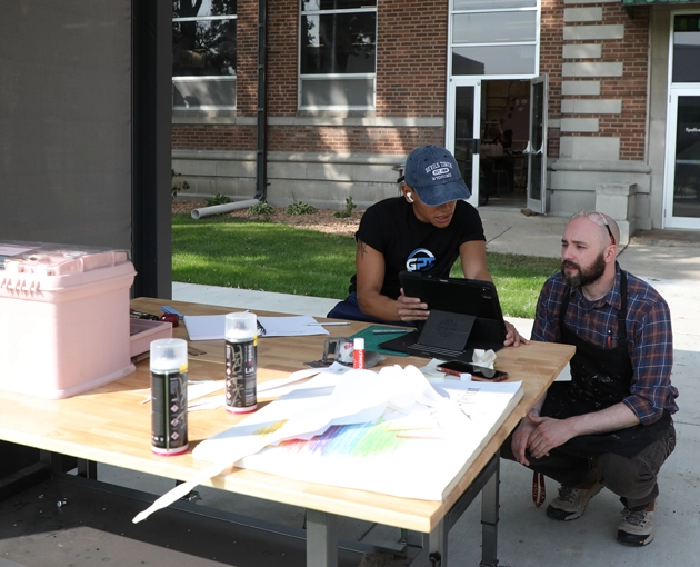 Students working on an art project outside