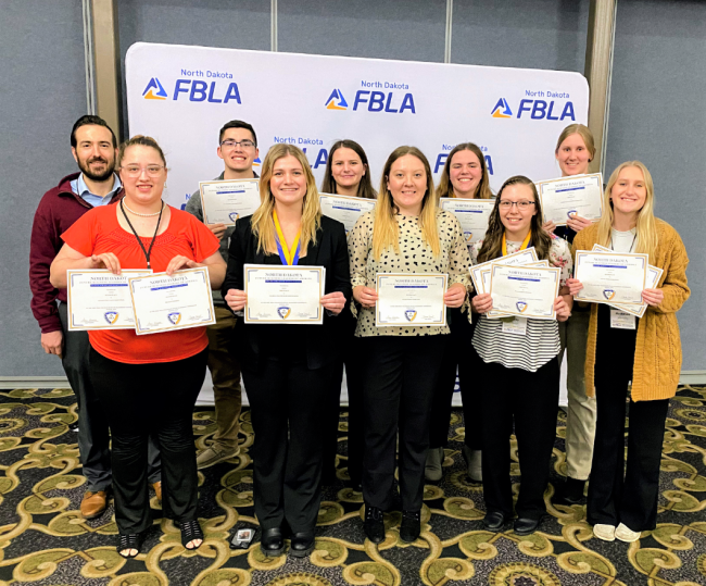 NSU FBLA students pictured with their professor at the State Leadership Conference
